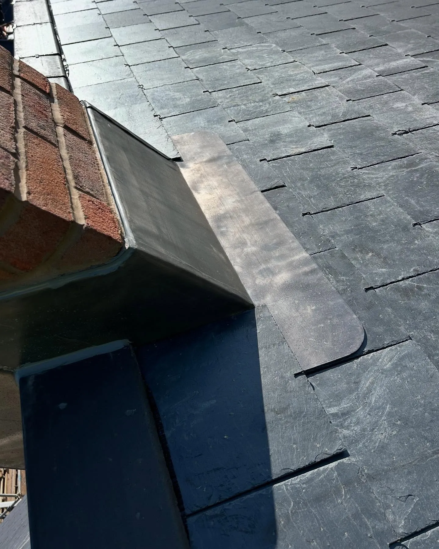 Rebuilt chimney stack with hand-dressed lead flashing on completion, Hampshire (1)