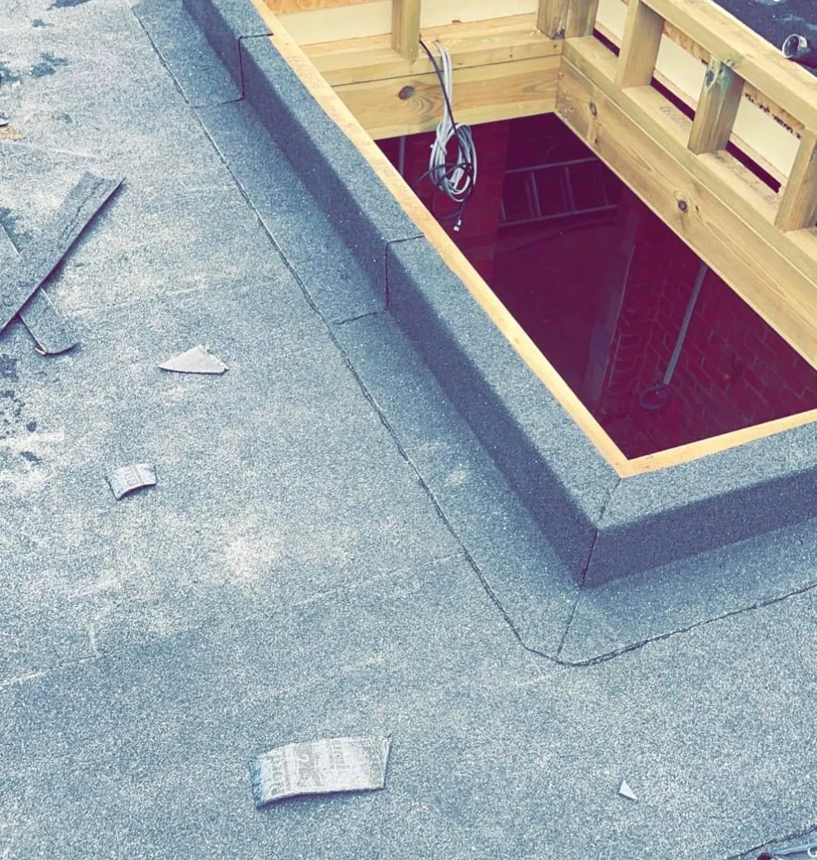Completed felt flat roof with clean upstands and perimeter drip trims, Hampshire (after)