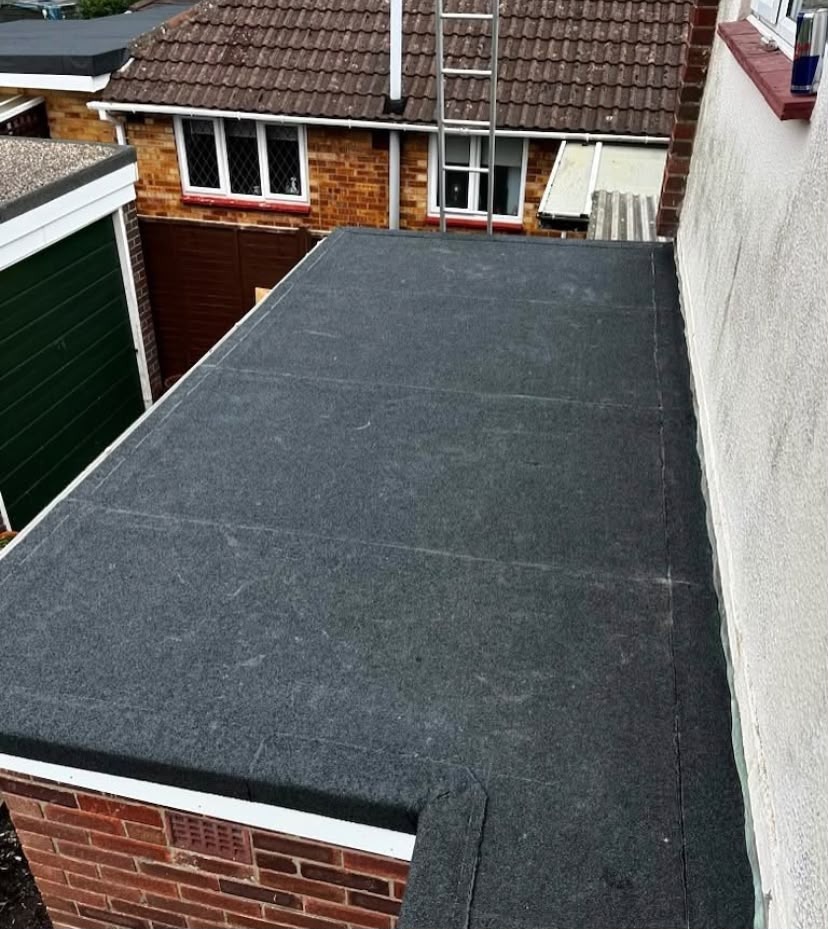 Garage flat roof rebuilt and finished with new felt and trims