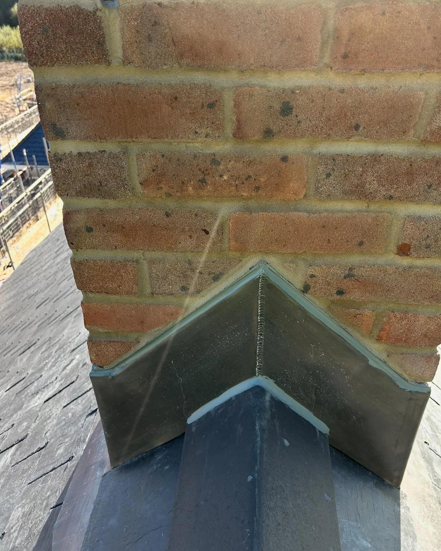 Rebuilt chimney stack with hand-dressed lead flashing on completion, Hampshire (after)