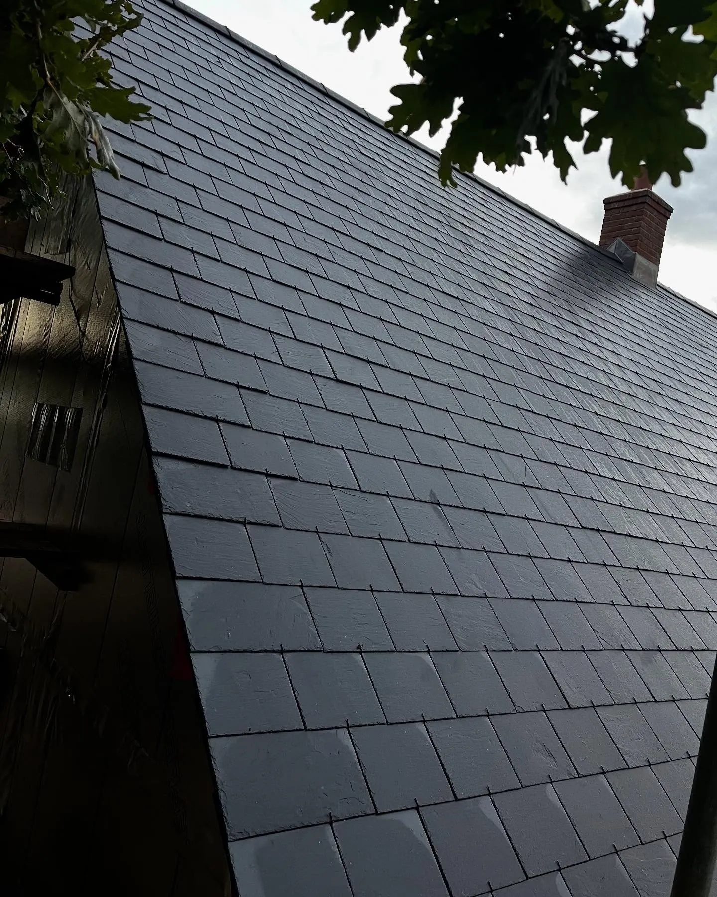 Completed re-roof with new slate and tile coverings by S&S Roofing, Hampshire (after)