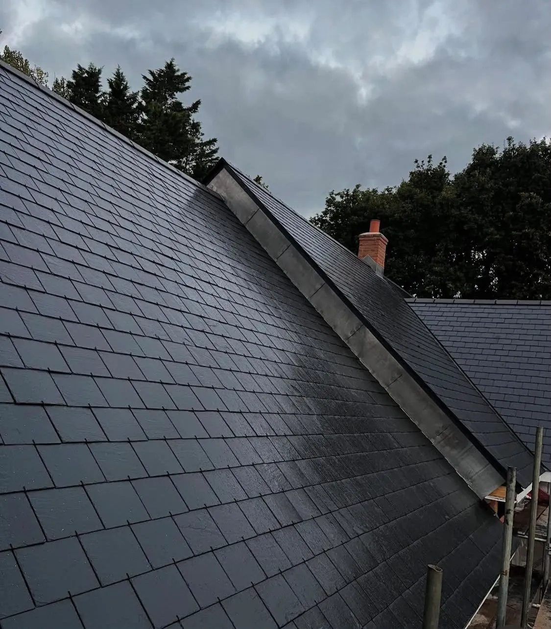 Completed grey slate re-roof by S&S Roofing in Hampshire