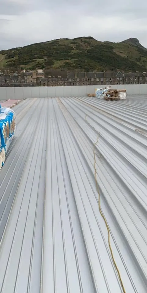 Profiled metal sheet roof installed on a commercial building (5)