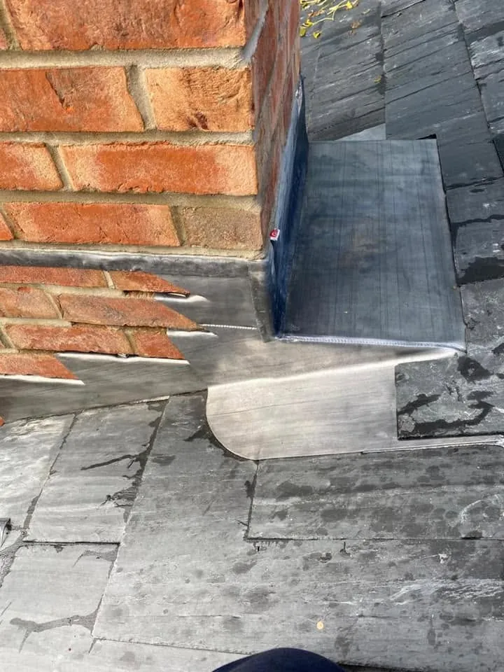 Rebuilt chimney stack with hand-dressed lead flashing on completion, Hampshire (2)